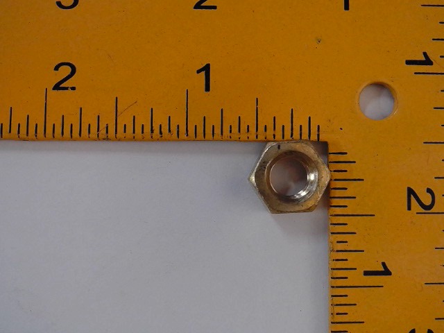813561 VERSATILE Nut